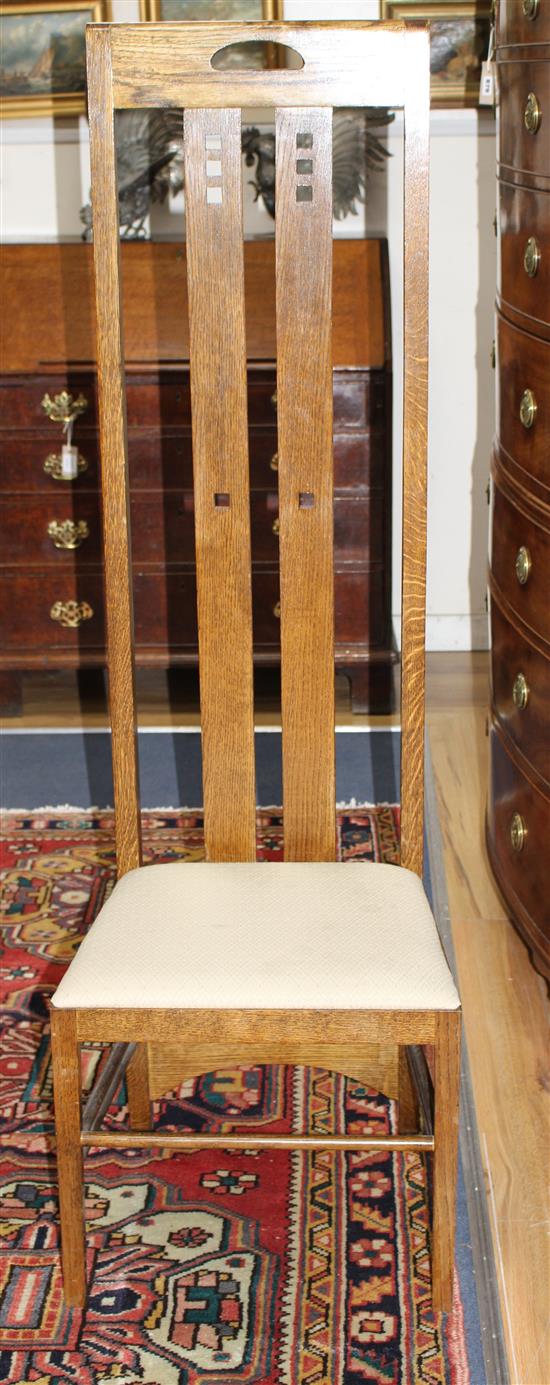 A set of six MacKintosh style oak high-backed dining chairs, W.49cm D.43cm H.151cm